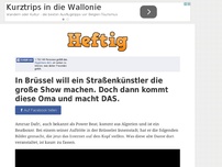 Bild zum Artikel: In Brüssel will ein Straßenkünstler die große Show machen. Doch dann kommt diese Oma und macht DAS.