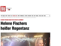 Bild zum Artikel: Konzert-Abbruch - Helene Fischers heißer Regentanz