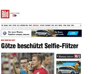 Bild zum Artikel: Was war da los? - Götze beschützt Selfie-Flitzer