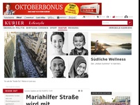 Bild zum Artikel: Mariahilfer Straße mit Flüchtlingsporträts gepflastert
