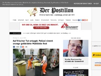 Bild zum Artikel: Auf frischer Tat ertappt: Polizei nimmt orange gekleidete Mülldiebe fest