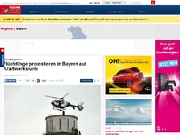 Bild zum Artikel: Flüchtlingskrise - Flüchtlinge protestieren in Bayern auf Kraftwerksturm