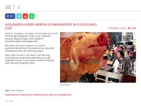 Bild zum Artikel: Ausländer-Hasser werfen Schweineköpfe in Flüchtlings-Café