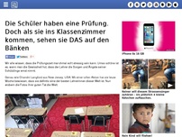 Bild zum Artikel: Die Schüler haben eine Prüfung. Doch als sie ins Klassenzimmer kommen, sehen sie DAS auf den Bänken