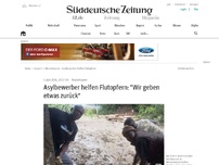 Bild zum Artikel: Asylbewerber helfen Flutopfern: 'Wir geben etwas zurück'