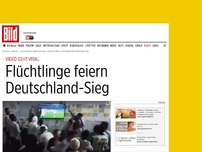 Bild zum Artikel: Video geht viral - Flüchtlinge feiern Deutschland-Sieg
