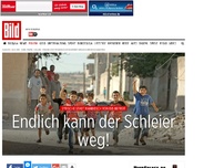 Bild zum Artikel: Manbidsch von ISIS befreit - Endlich kann die Burka weg!