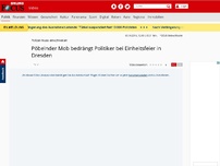 Bild zum Artikel: Polizei muss einschreiten - Pöbelnder Mob bedrängt Politiker bei Einheitsfeier in Dresden