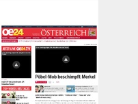 Bild zum Artikel: Pöbel-Mob beschimpft Merkel