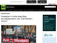 Bild zum Artikel: Protestler in Halle begrüßen Bundeskanzlerin mit „Heil Merkel“-Ausruf