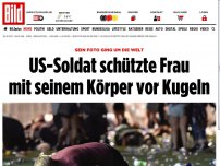 Bild zum Artikel: Foto ging um die Welt - US-Soldat schützte  Frau mit seinem Körper