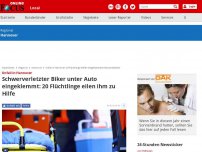 Bild zum Artikel: Unfall in Hannover - Schwerverletzter Biker unter Auto eingeklemmt: 20 Flüchtlinge eilen ihm zu Hilfe