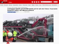 Bild zum Artikel: Fahrzeuge auf A3 verunglückt - Gaffer filmen Lkw-Unfall mit drei Toten auf A3: Feuerwehr richtet Wasserschläuche auf sie