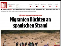 Bild zum Artikel: Urlauber schauen zu - Migranten flüchten an spanischen Strand