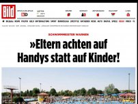 Bild zum Artikel: Schwimmmeister warnen - »Eltern achten auf Handys statt auf Kinder!