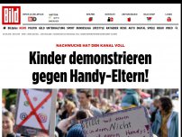 Bild zum Artikel: Nachwuchs hat den Kanal voll - Kinder demonstrieren gegen Handy-Eltern!