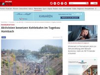 Bild zum Artikel: Hambacher Forst - Aktivisten besetzen Kohlebahn im Tagebau Hambach