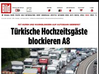 Bild zum Artikel: Hupend auf Autobahn gebremst - Türkische Hochzeitsgäste blockieren A8