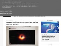 Bild zum Artikel: Sensation! Postillon präsentiert erstes Foto von Foto von schwarzem Loch