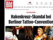 Bild zum Artikel: Auf der Bühne - Hakenkreuz-Skandal bei Berliner Tattoo-Convention