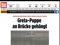 Bild zum Artikel: Gruselige Drohung - Greta-Puppe an Brücke gehängt