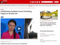 Bild zum Artikel: In Rom - Unbekannte knüpfen Greta-Thunberg-Puppe an Brücke auf