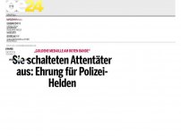 Bild zum Artikel: Sie töteten den Attentäter: Ehrung für Polizei-Helden