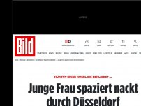 Bild zum Artikel: Nur mit einem Eis bekleidet... - Junge Frau spaziert nackt durch Düsseldorf