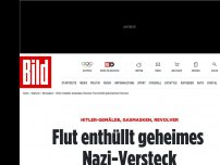 Bild zum Artikel: Hitler-Gemälde, Gasmasken, Revolver - Flut enthüllt geheimes Nazi-Versteck