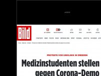 Bild zum Artikel: Proteste vor Dresdner Klinik - Medizinstudenten stellen sich gegen Corona-Demo