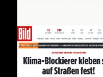 Bild zum Artikel: Aktionen an 3 Flughäfen - Klima-Blockierer kleben sich vor dem BER fest!