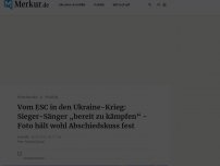 Bild zum Artikel: Vom ESC in den Ukraine-Krieg: Sieger-Sänger „bereit zu kämpfen“ - Foto hält wohl Abschiedskuss fest