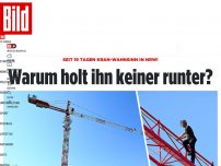 Bild zum Artikel: Seit 19 Tagen Kran-Wahnsinn in NRW! - Warum holt ihn keiner runter?