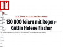 Bild zum Artikel: Nach Wetter-Chaos vor dem Mega-Konzert - 130 000 feiern mit Regen-Göttin Helene Fischer