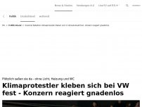 Bild zum Artikel: Klimaaktvisten kleben sich bei VW fest<br>