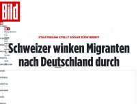 Bild zum Artikel: Staatsbahn stellt sogar Züge bereit - Schweizer winken Migranten nach Deutschland durch