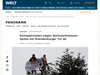Bild zum Artikel: Klimaaktivisten sägen Weihnachtsbaum-Spitze am Brandenburger Tor ab