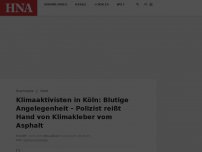 Bild zum Artikel: Klimaaktivisten in Köln: Blutige Angelegenheit – Polizist reißt Hand von Klimakleber vom Asphalt