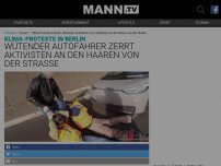 Bild zum Artikel: VIDEO: Autofahrer zerrt Klima-Aktivisten an den Haaren von der Straße