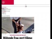 Bild zum Artikel: Wütende Frau zerrt Klima-Kleberin an den Haaren von der Straße