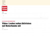 Bild zum Artikel: Video: Lenker nahm Aktivisten auf Motorhaube mit